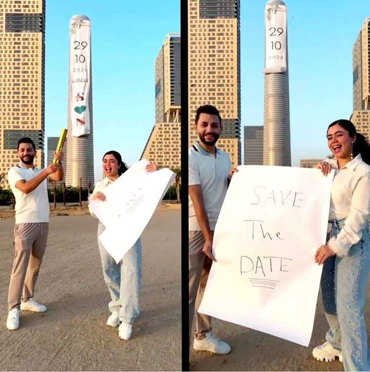 "سمير وندى" ثنائي مصري يعلن زواجه من أعلى قمة البرج الأيقوني بالعاصمة الإدارية